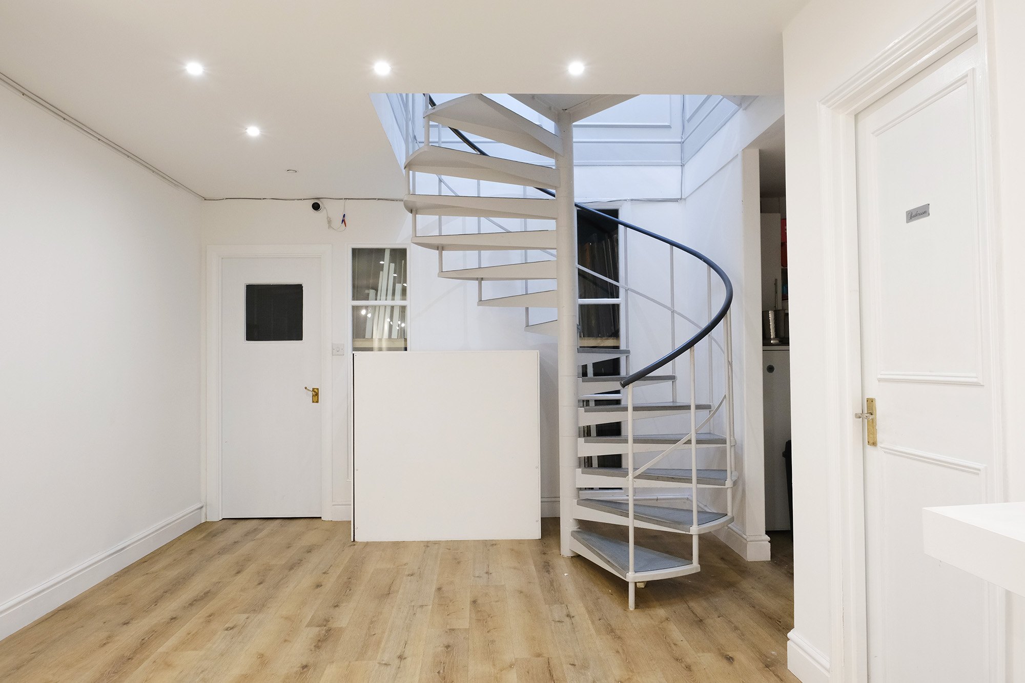 The spiral staircase between floors