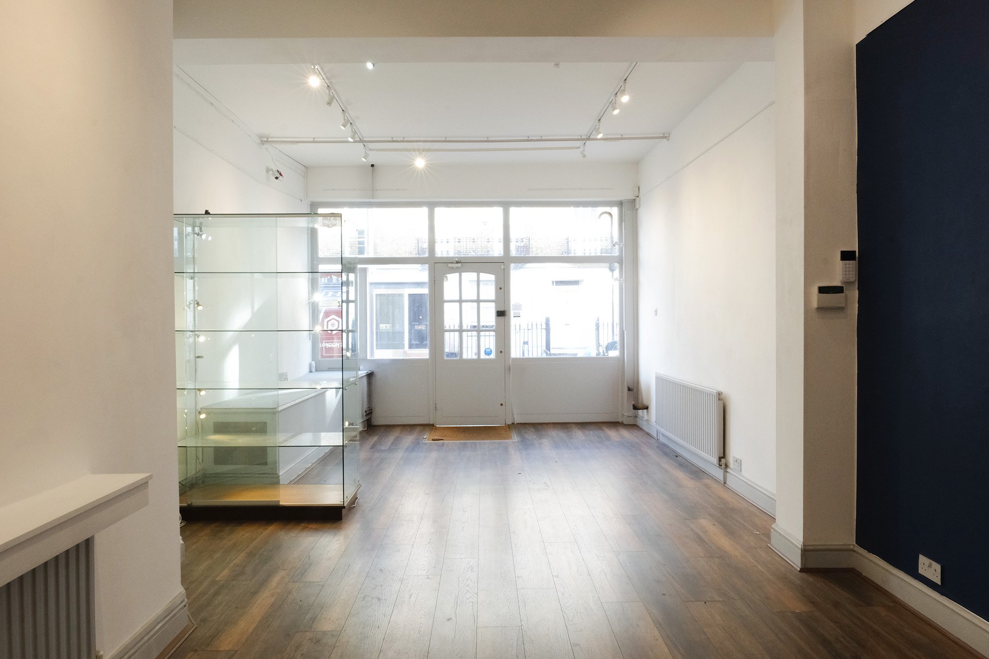 Glass cabinets by the street windows